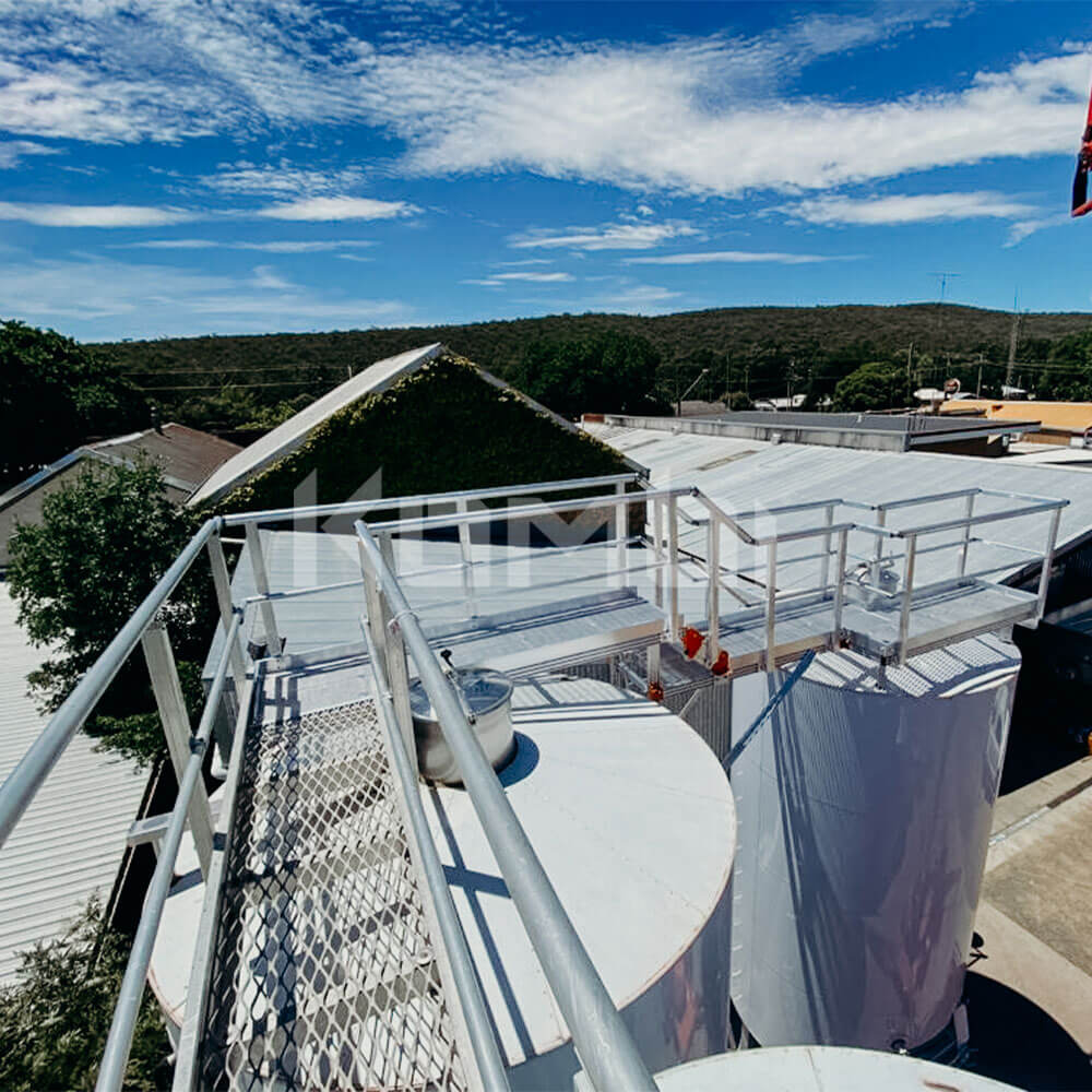 KOMBI Stairs and Platforms providing access to storage vats at winery