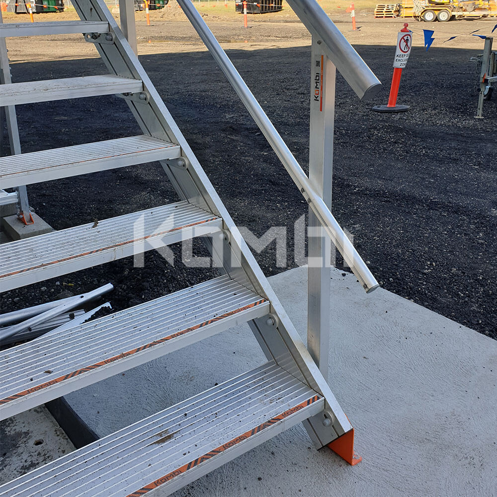Kombi modular stair and platform systems giving access to site shed install showing treads