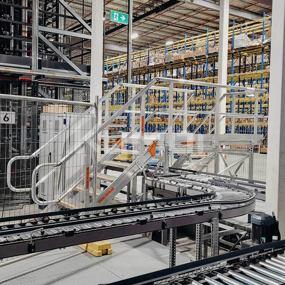 KOMBI Crossovers provide logistic solutions when access is needed over conveyors